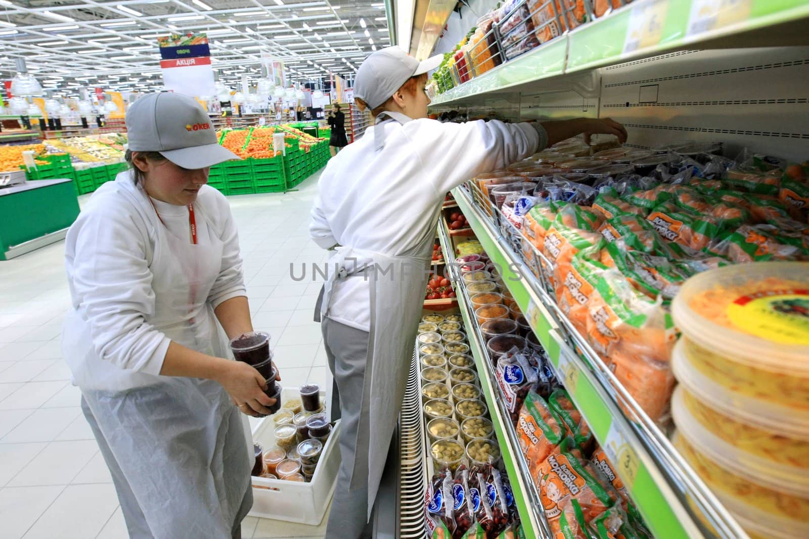 KYIV, UKRAINE - NOVEMBER 13: Worker in supermarket during prepare to opening first store of OK supermarket network on November 13, 2007 in Kyiv, Ukraine.