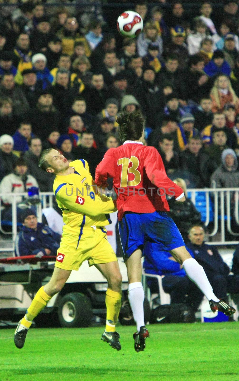KYIV, UKRAINE - MARCH 26: Oleh Husyev (C) and Aleksandar Lukovic fight for a ball during the friendly match between the Ukrainian and Serbian national teams on Marc 26, 2008 in Kyiv, Ukraine