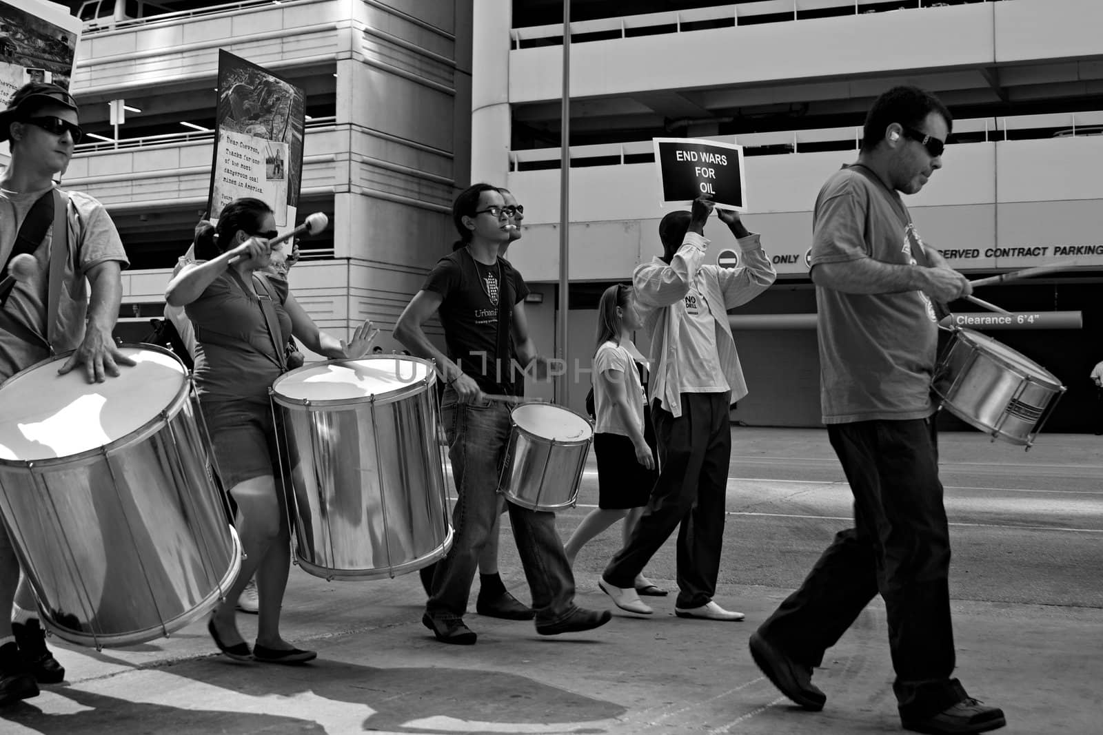 Protesters playing drums at the Rainforest Coalitions protest at the annual Chevron board meeting.