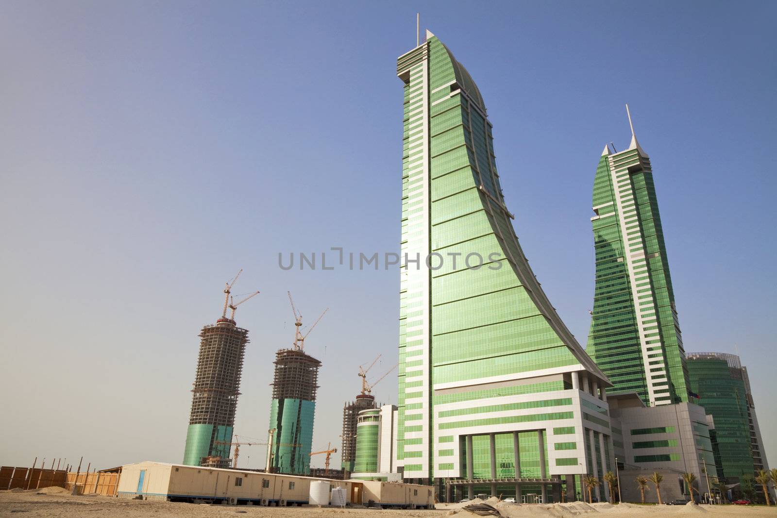 Image of the Financial Harbour towers in the desert, Manama, Bahrain.