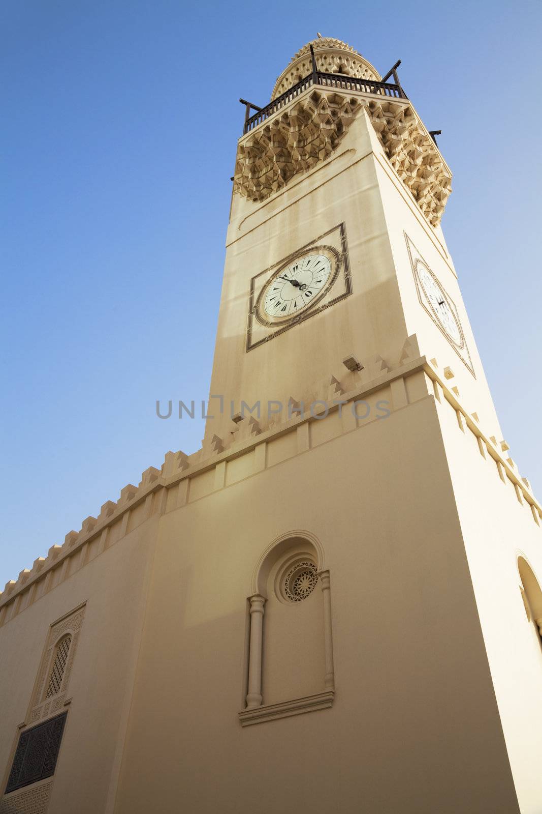 Image of a small mosque right in the middle of the city in Manama, Bahrain.