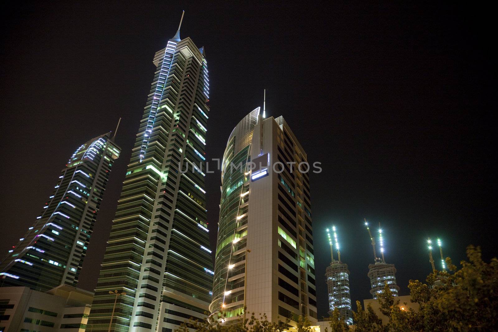 Night image of Bahrain's iconic buildings, the Bahrain Financial Harbour, Manama, Bahrain.