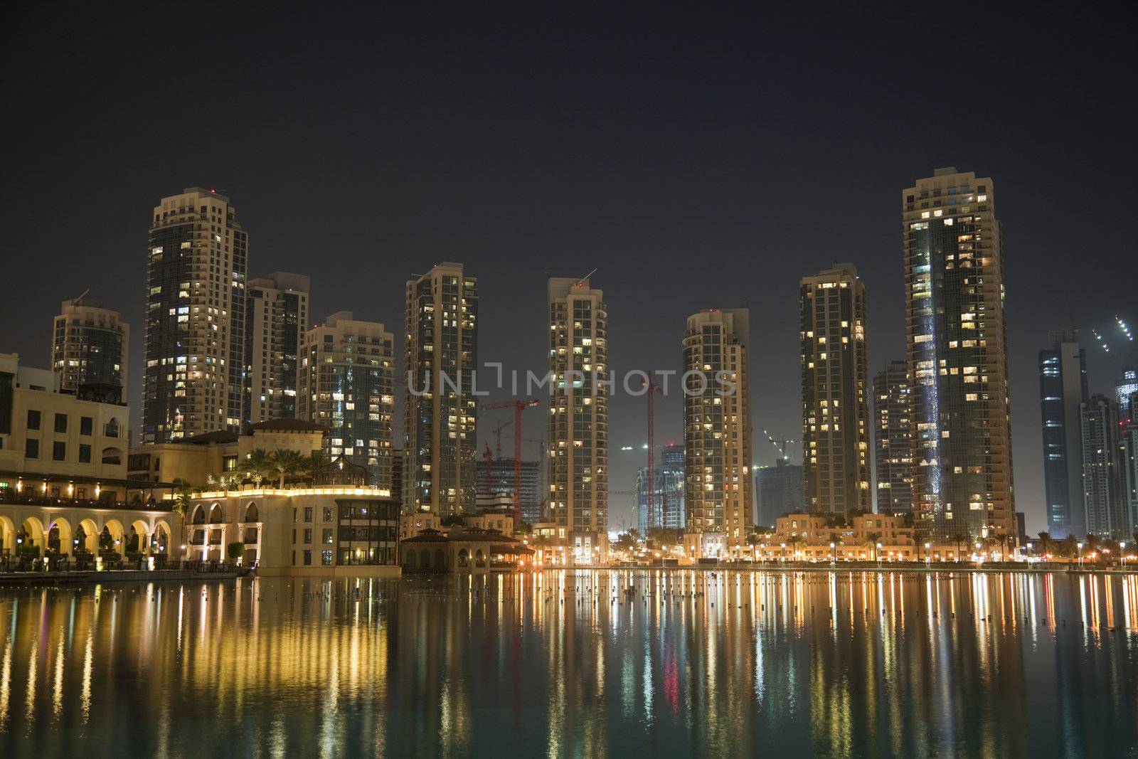 Night image of Dubai skyline, United Arab Emirates.
