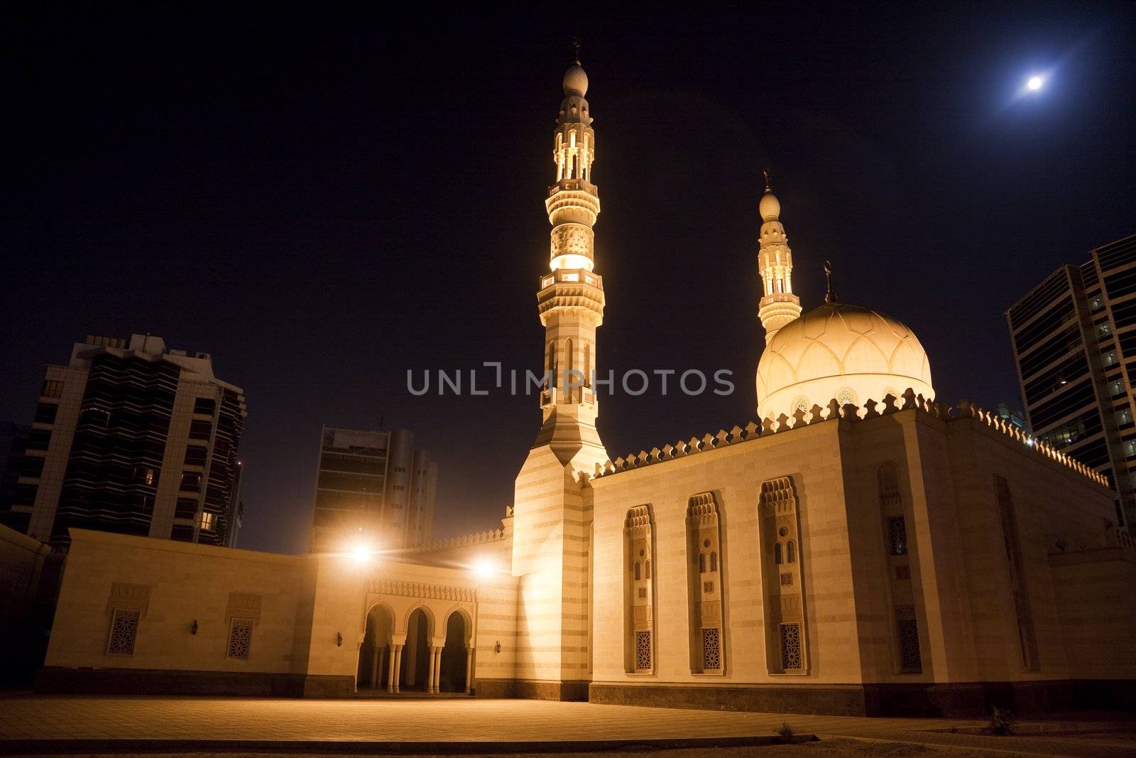 Night image of the Deira City Center mosque at Deira, Dubai, United Arab Emirates.