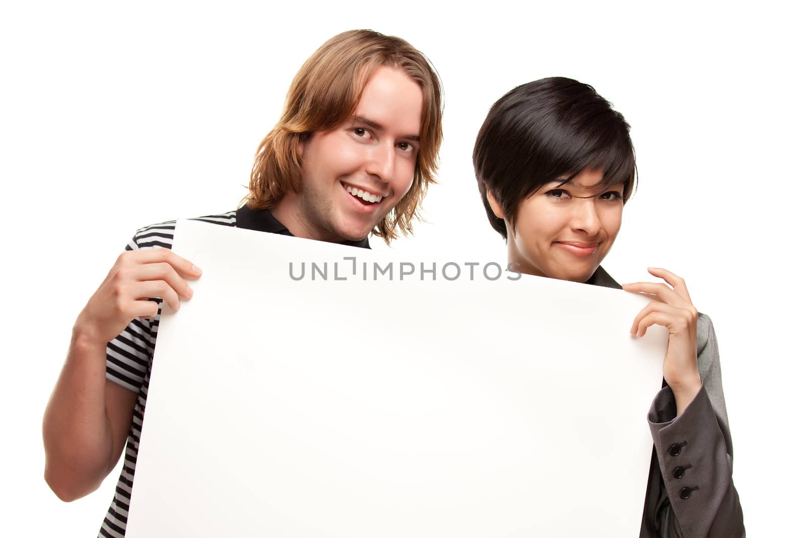 Attractive Diverse Couple Holding Blank White Sign Isolated on a White Background.