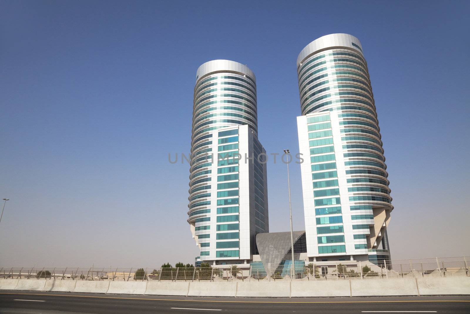 Image of a modern building in the Dubai desert, United Arab Emirates.
