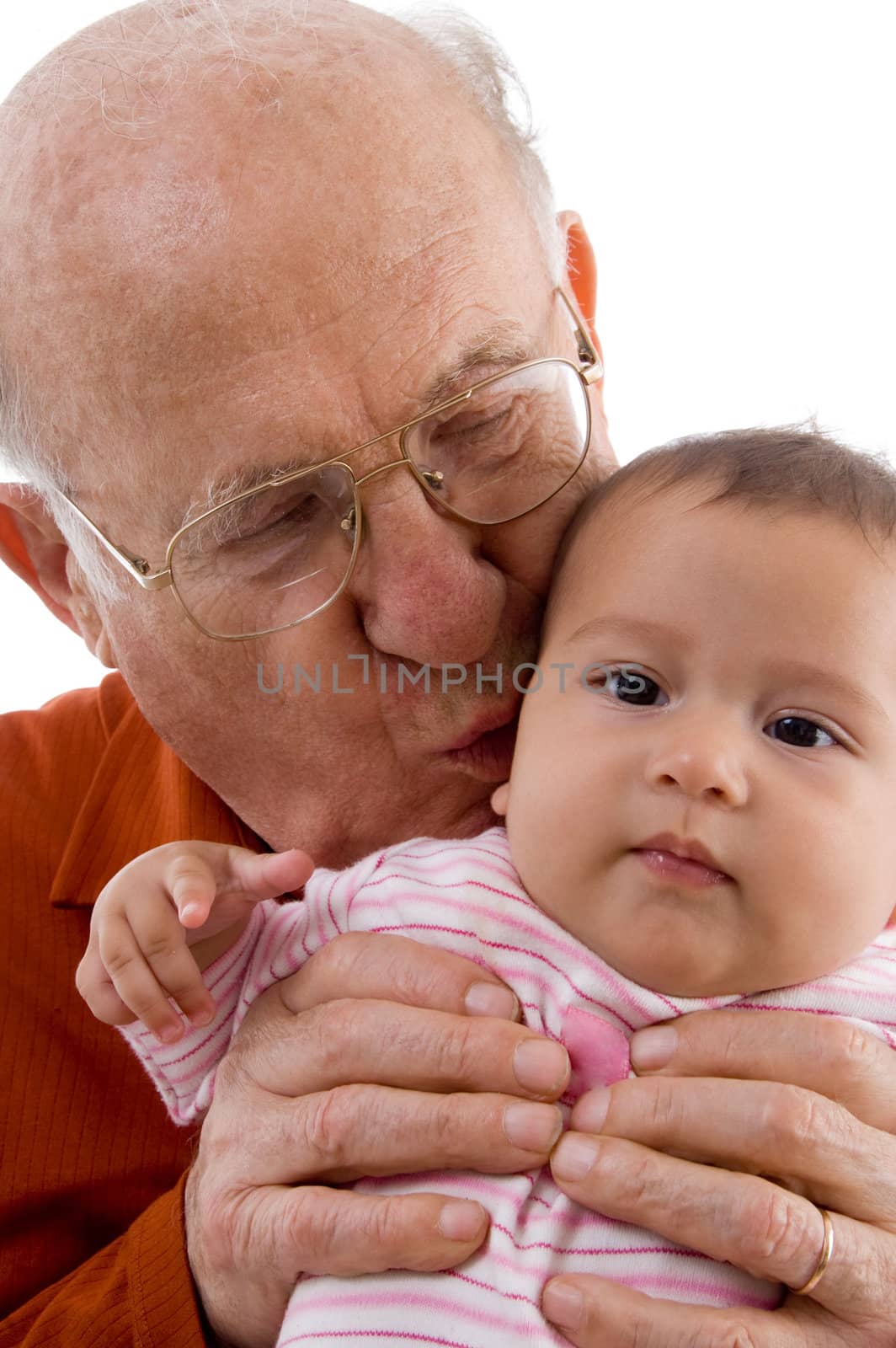 old man kissing the cute baby with white background