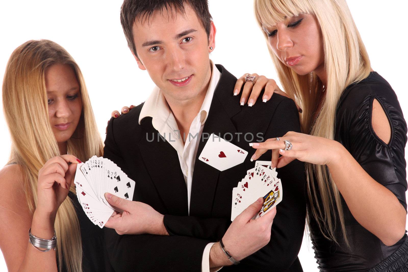 Magician make performance cards with two beauty girls