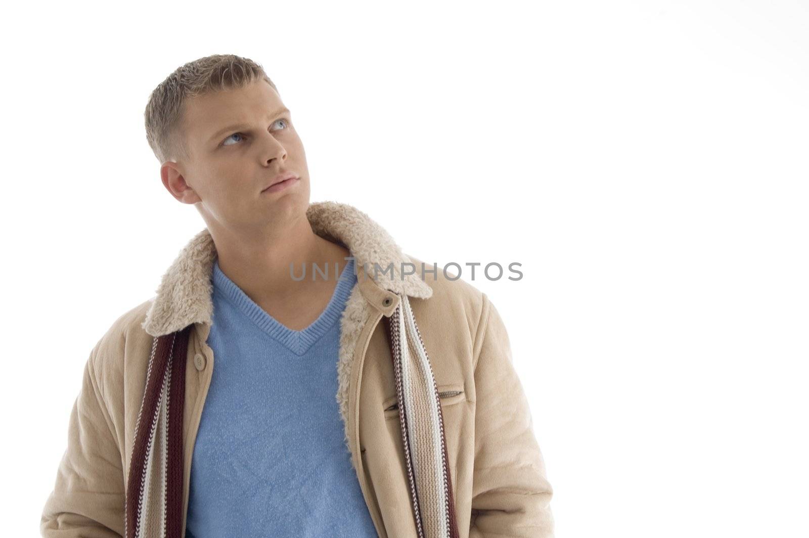 portrait of handsome male against white background