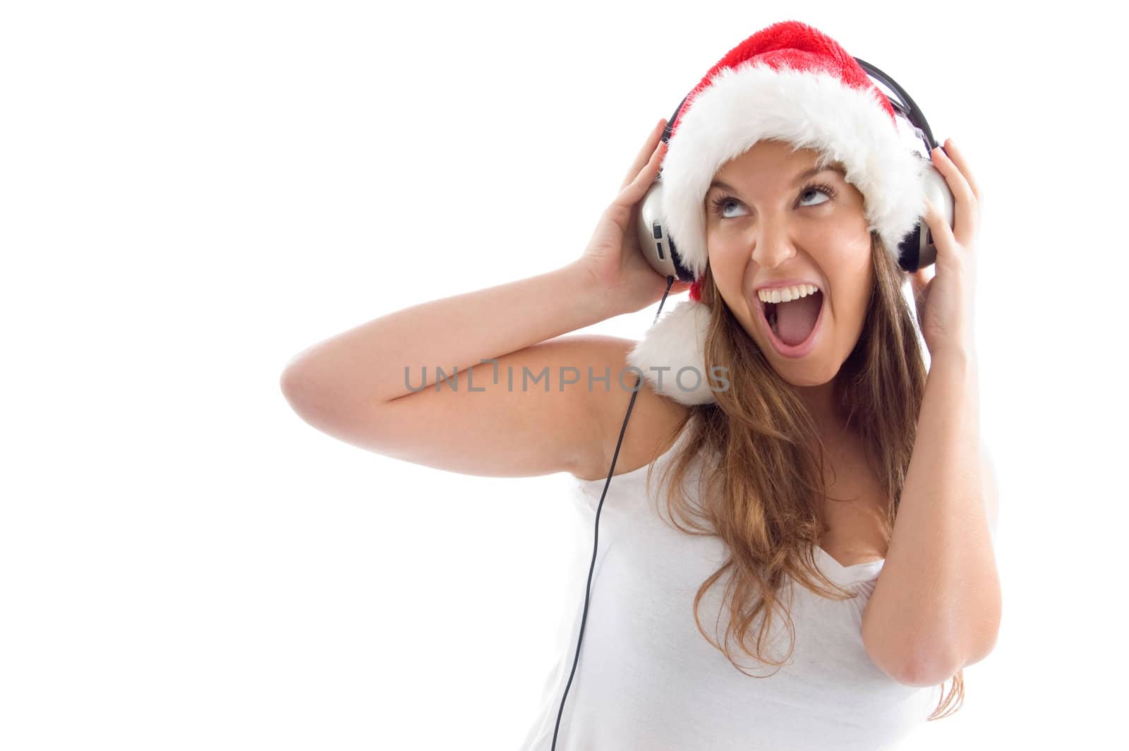 model with christmas hat and headphone on an isolated white background