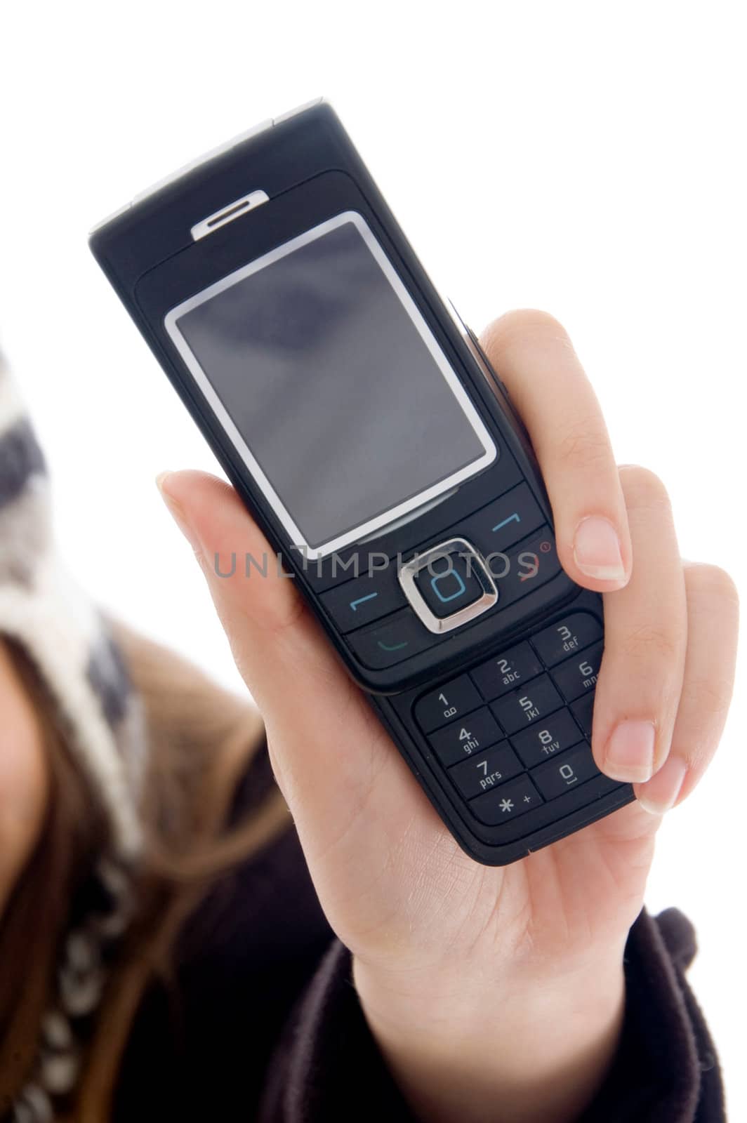 young girl's hand showing mobile phone against white background