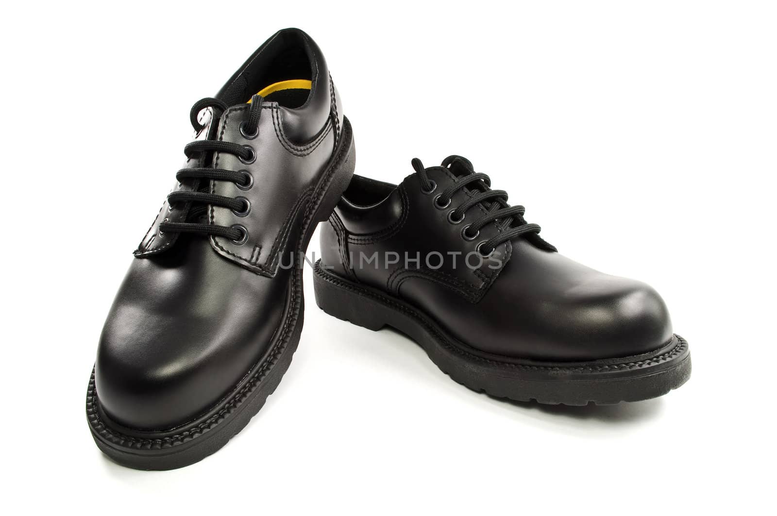 High resolution photo of a pair of black men's shoes.