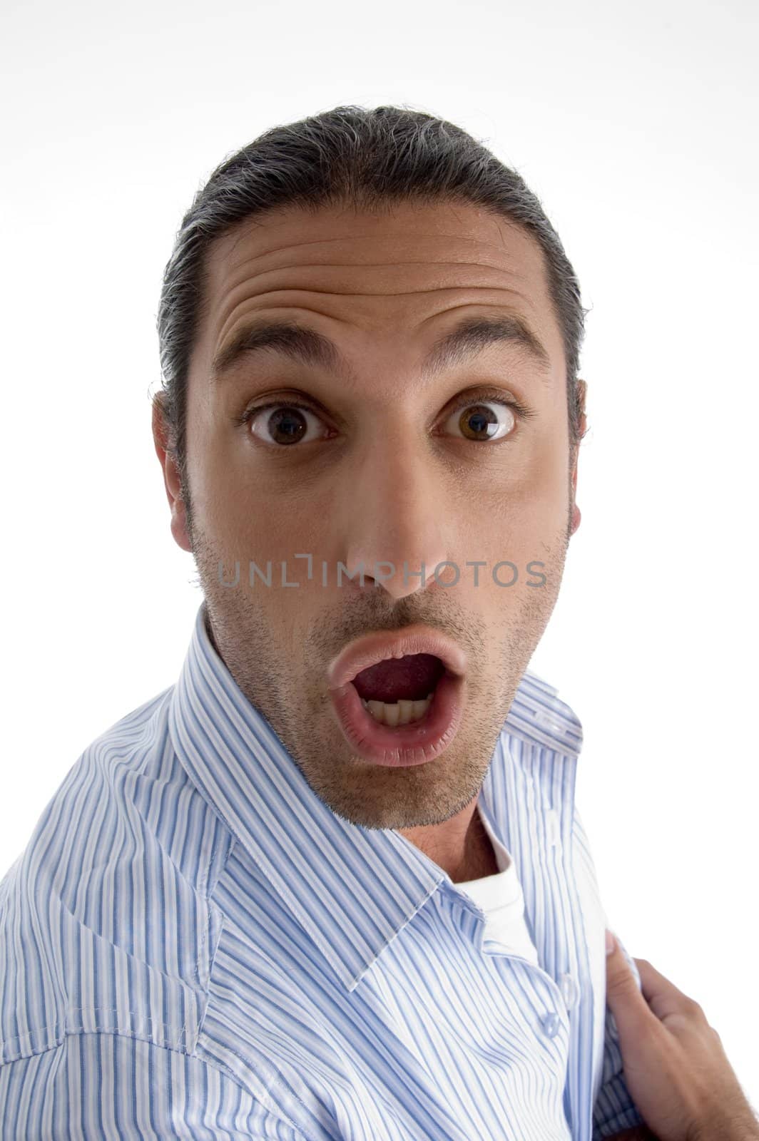 man surprised with facial expressions against white background