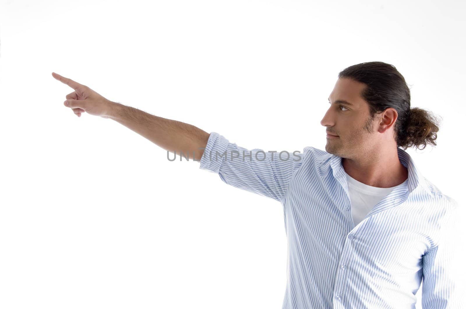 fashionable man pointing sideways with white background