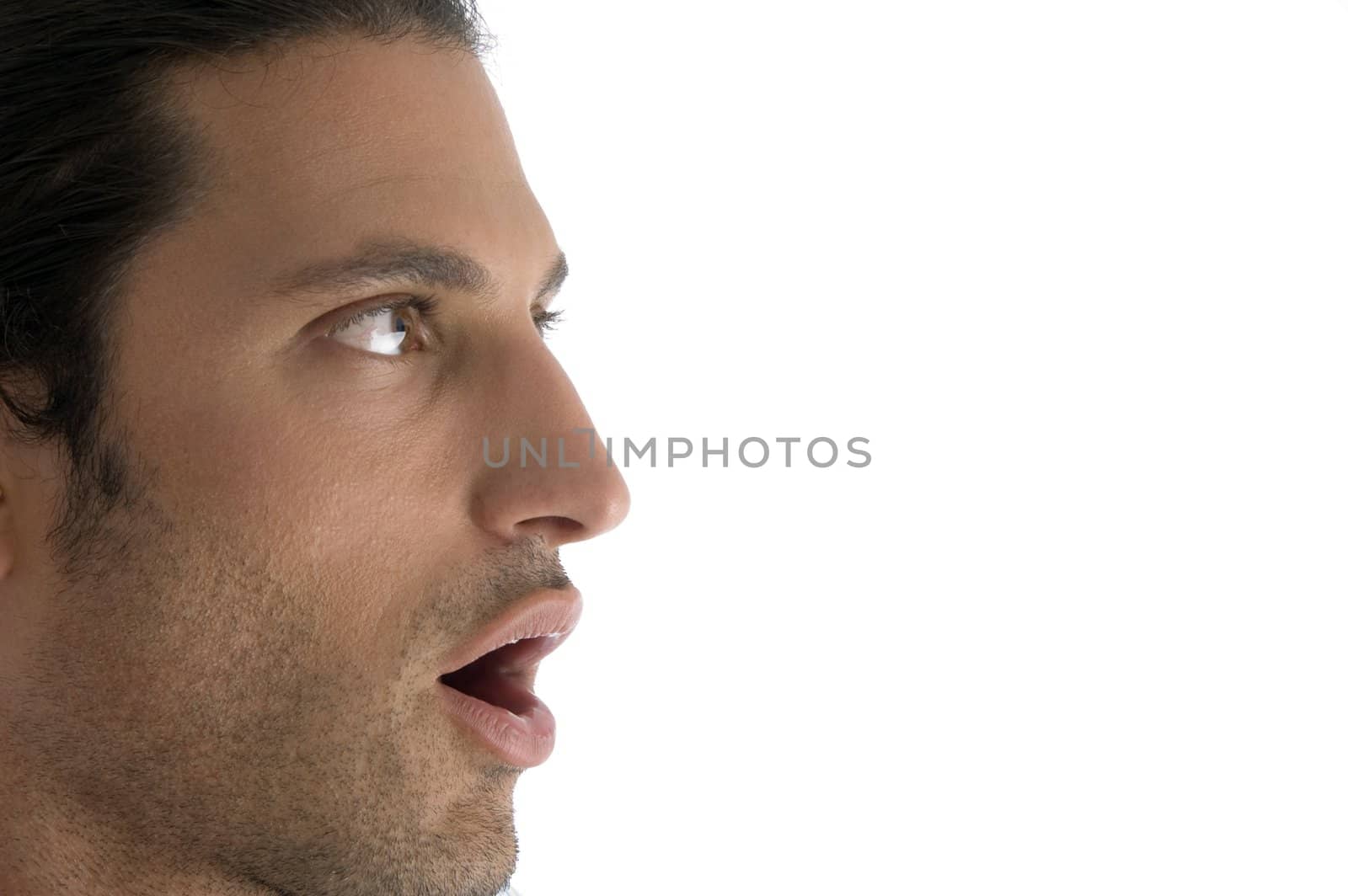 young guy surprised with facial expressions on an isolated background