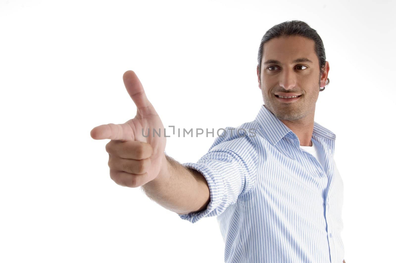 young handsome guy pointing on an isolated white background