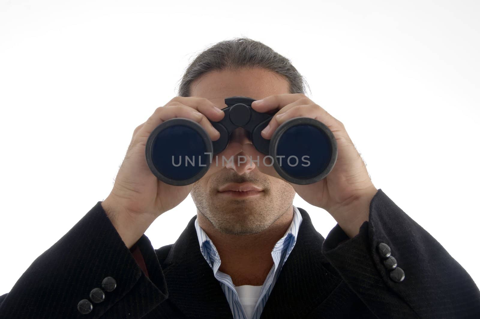 young handsome executive looking through binoculars on an isolated white background