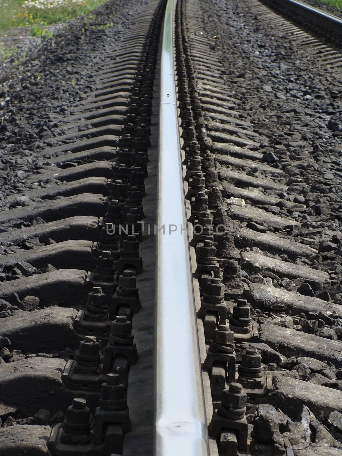 The railway, details: rails, cross ties, bolts 