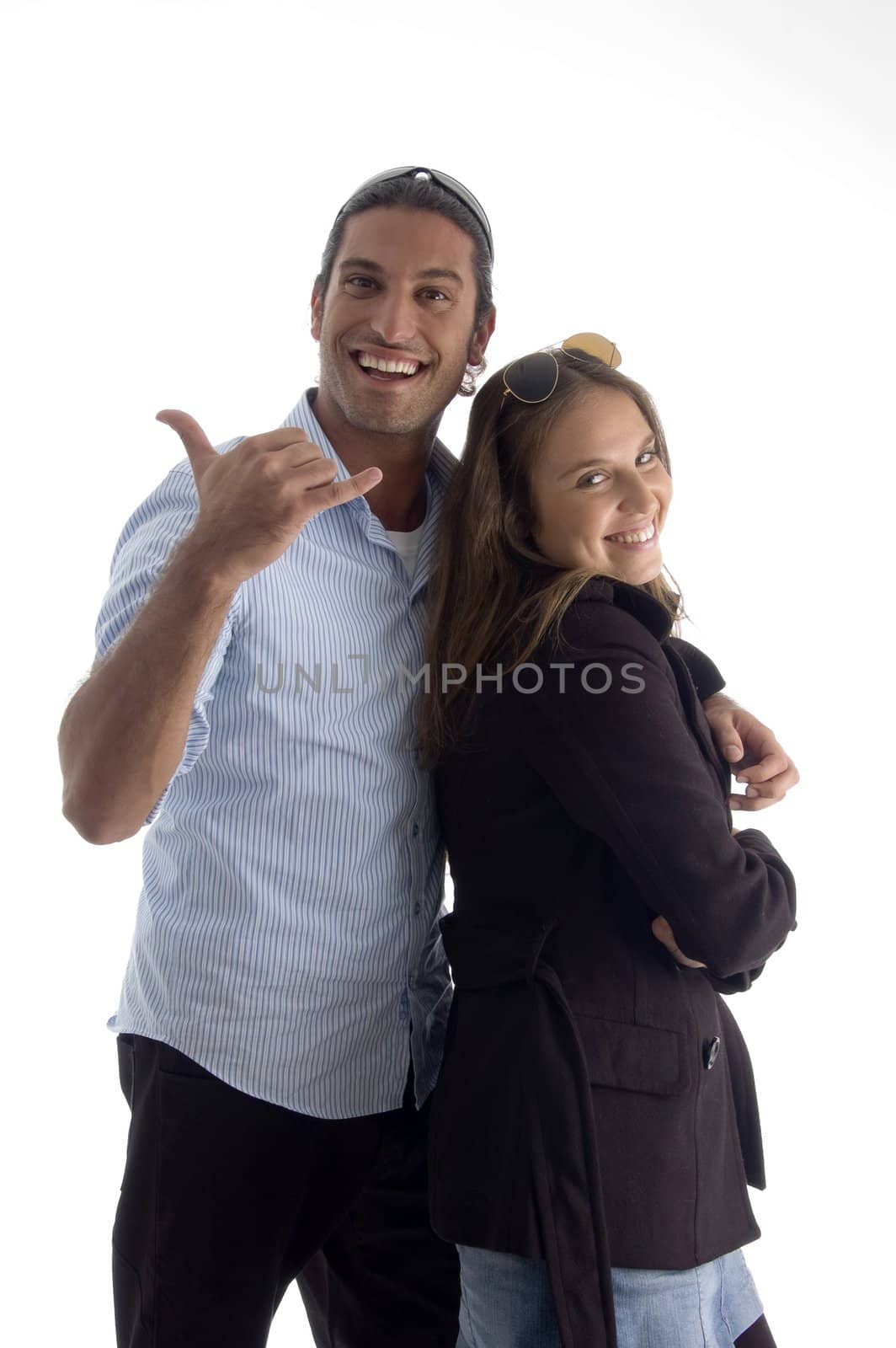 young caucasian man posing with his girlfriend on an isolated background