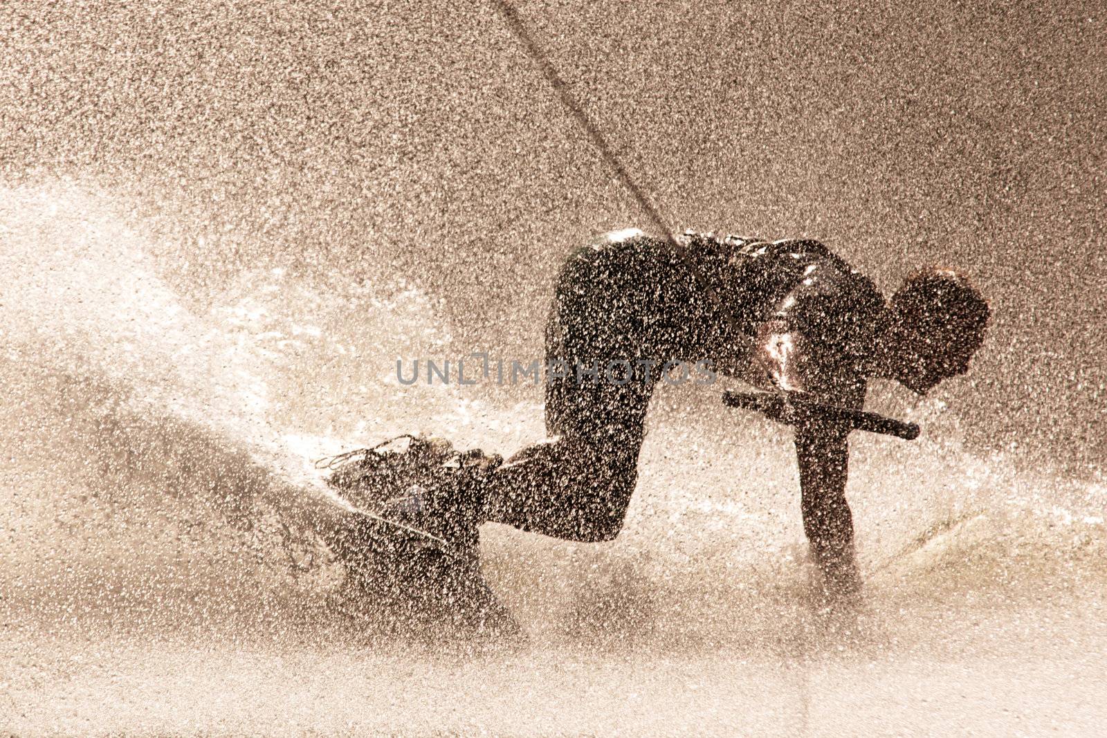 Dynamic Photo Of A Person Drifting While Waterboarding
