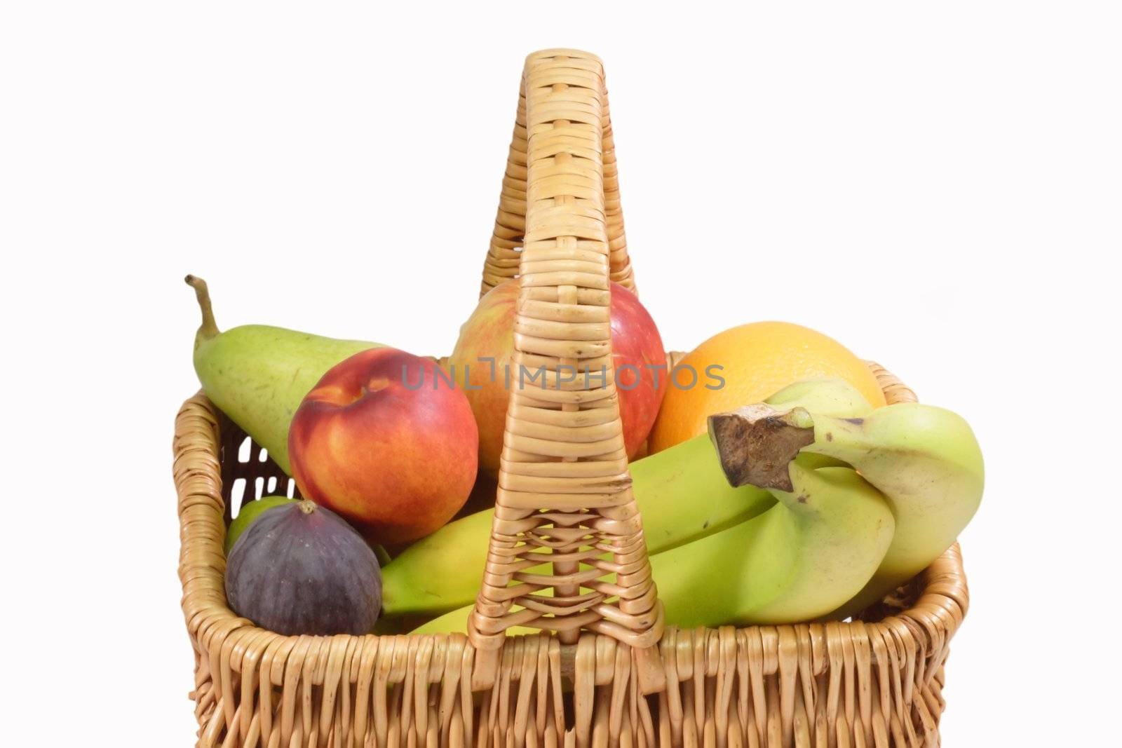 Fresh fruits in a basket on white background