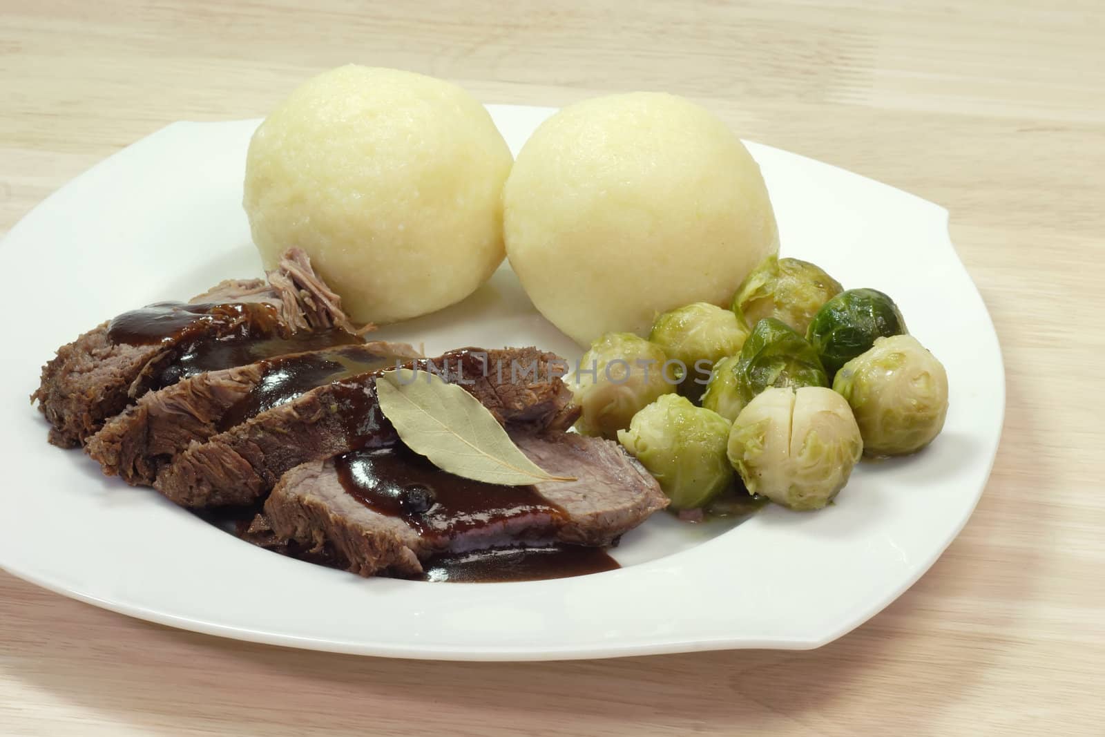 Roasted beef with potatoe dumbling and brussel sprouts