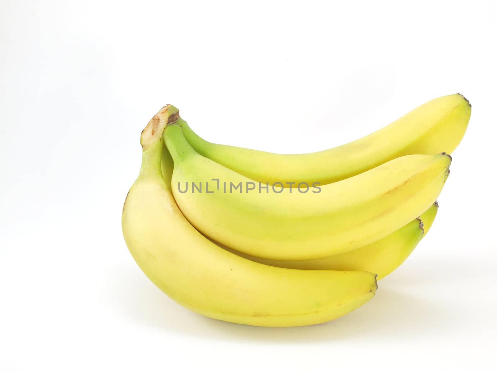 fresh and ripe dessert bananas on white