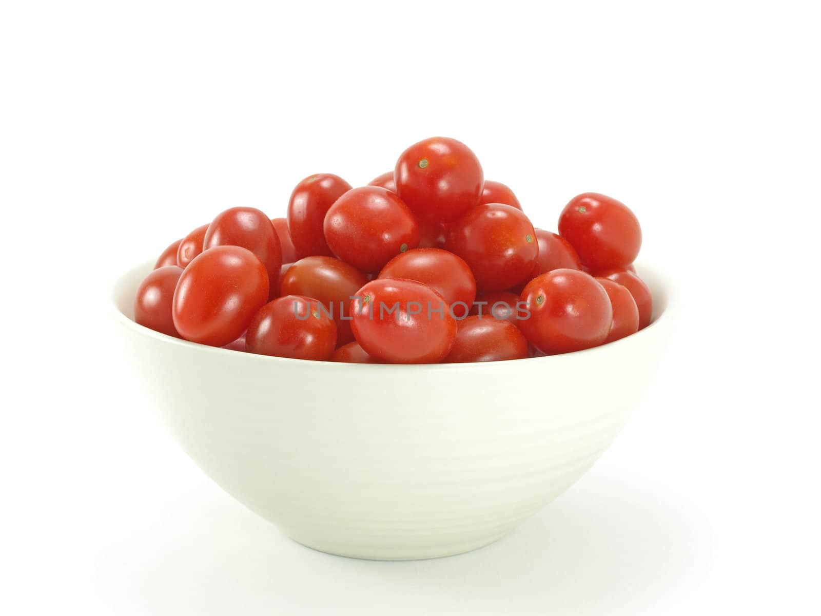 bowl of italian ripe cherry tomatoes on white background    