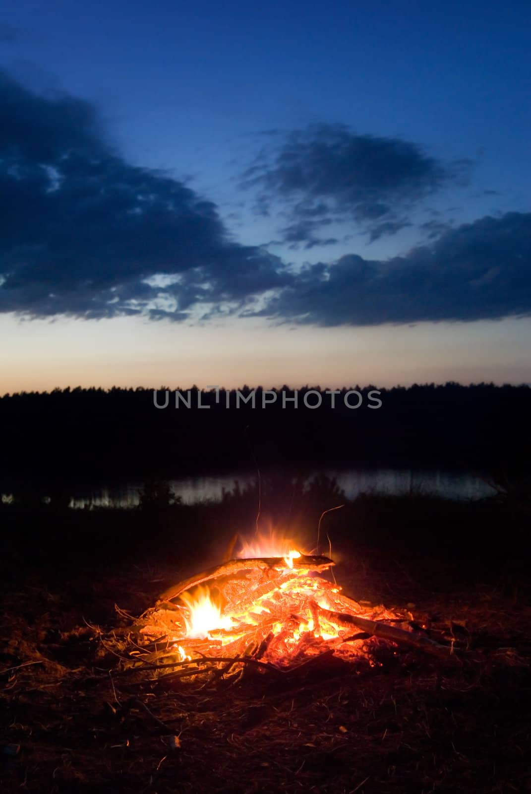 Campfire at dusk. Long exposure.