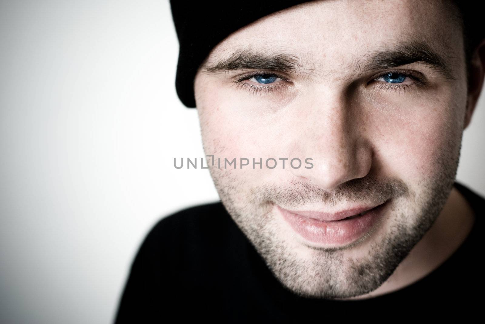 Portrait of young man - selective focus on the eyes.