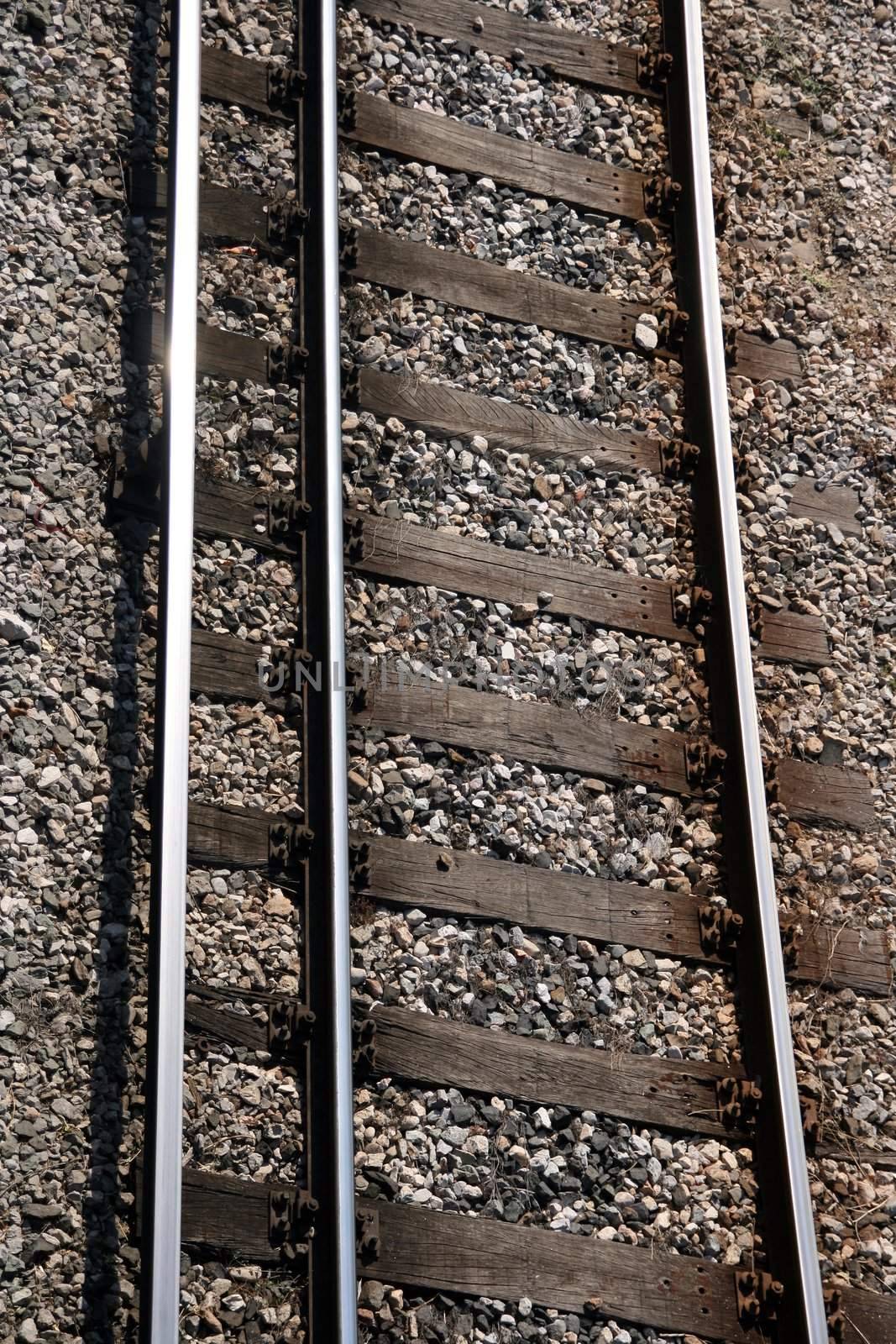 train rails vertical closeup for background use transportation industry