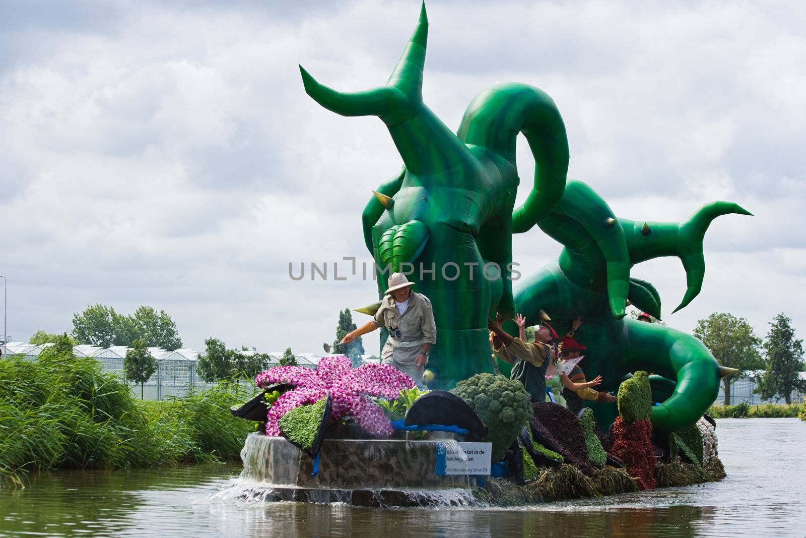 WESTLAND,THE NETHERLANDS - AUGUST 2009: Fabulous decorated boats in the spectacular annual Westland Floating Flower Parade August 02, 2010, Maasland, the Netherlands. 
