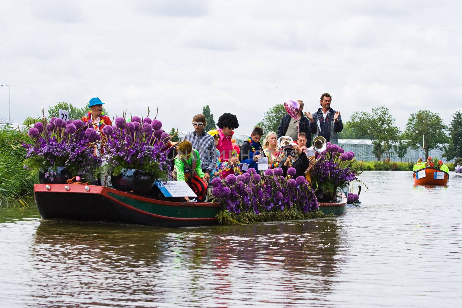 WESTLAND,THE NETHERLANDS - AUGUST 2009: Fabulous decorated boats in the spectacular annual Westland Floating Flower Parade August 02, 2010, Maasland, the Netherlands. 
