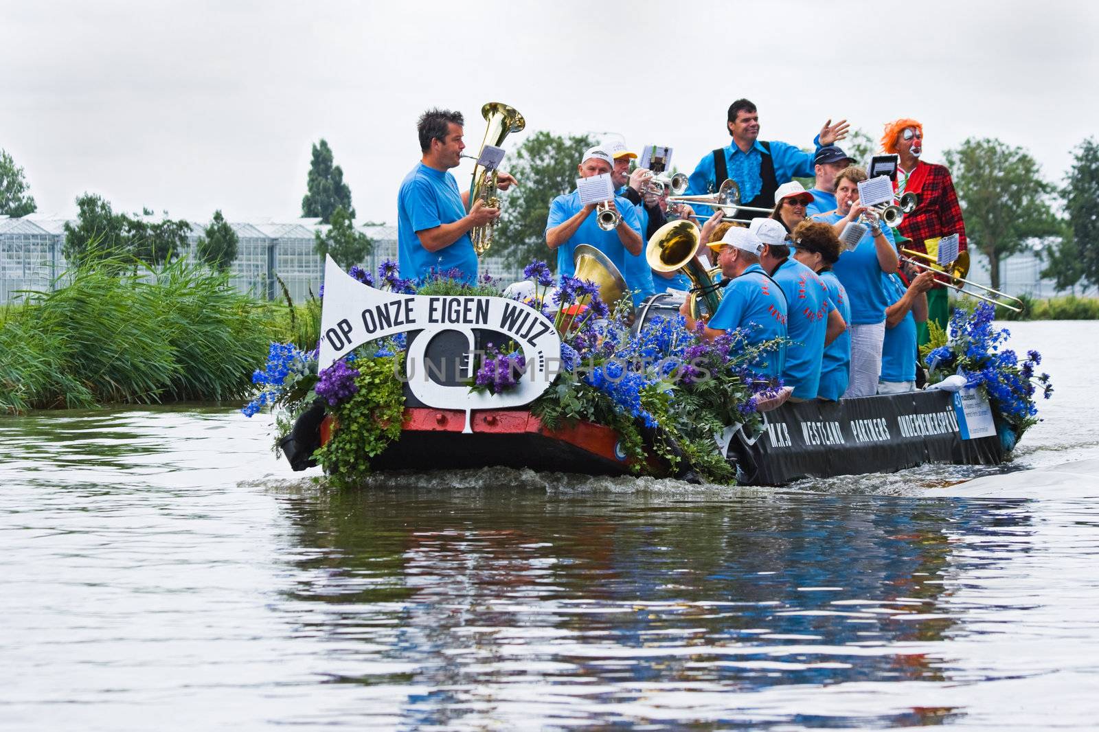 WESTLAND,THE NETHERLANDS - AUGUST 2009: Fabulous decorated boats in the spectacular annual Westland Floating Flower Parade August 02, 2010, Maasland, the Netherlands. 
