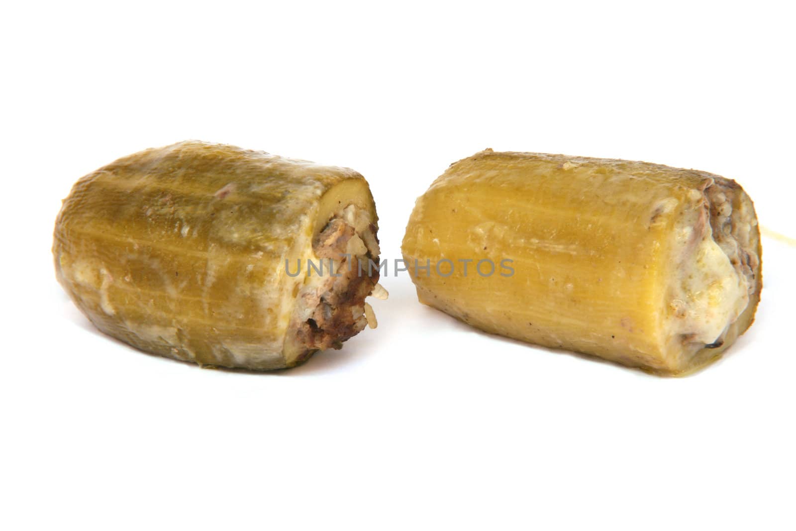traditional greek cuisine Baked stuffed courgettes isolated on white