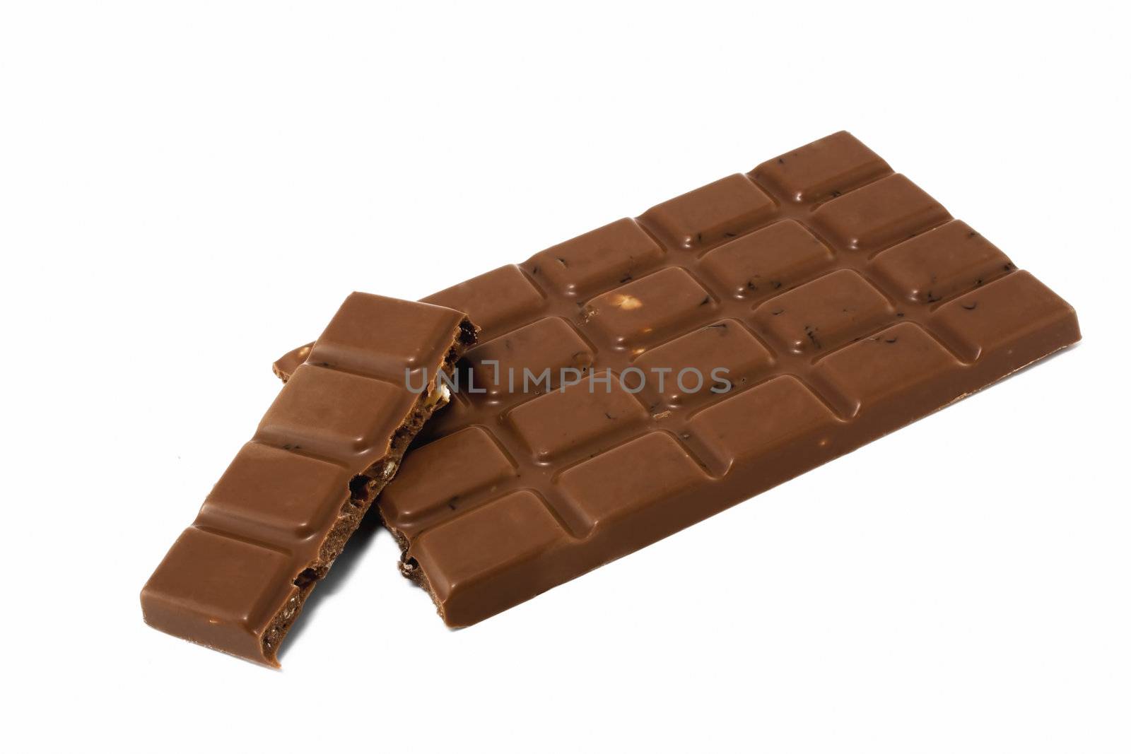 Milk chocolate with nuts isolated on white