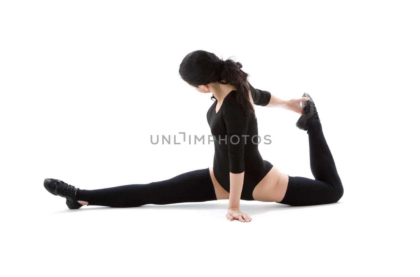 fitness instructor in black leotard over white