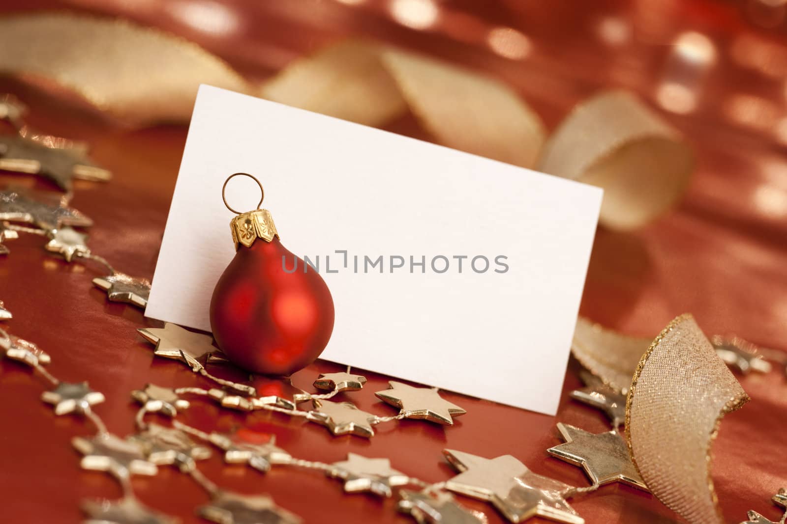 Christmas card with bauble. Selective focus, aRGB.