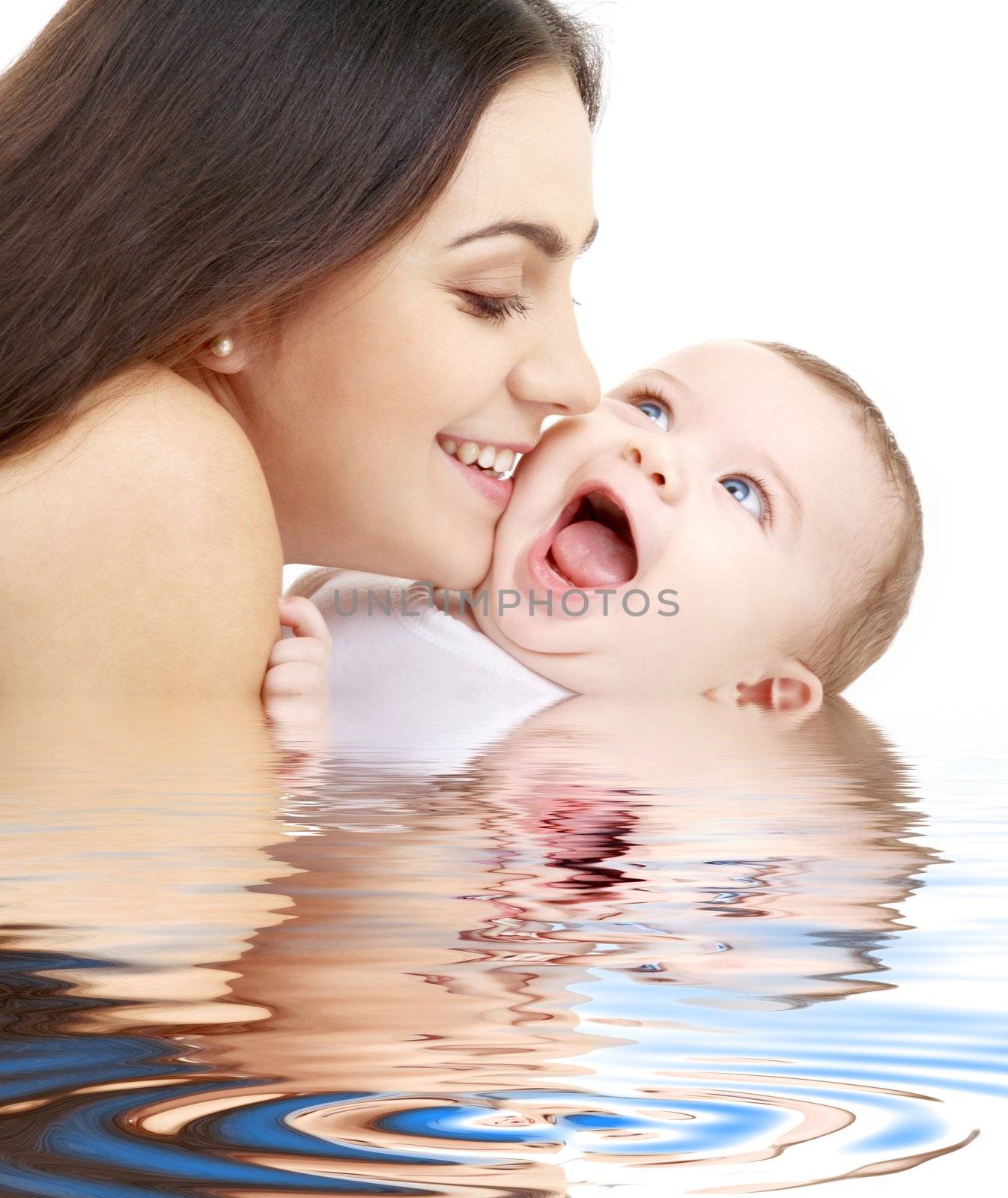 playful mama with happy baby in water by dolgachov