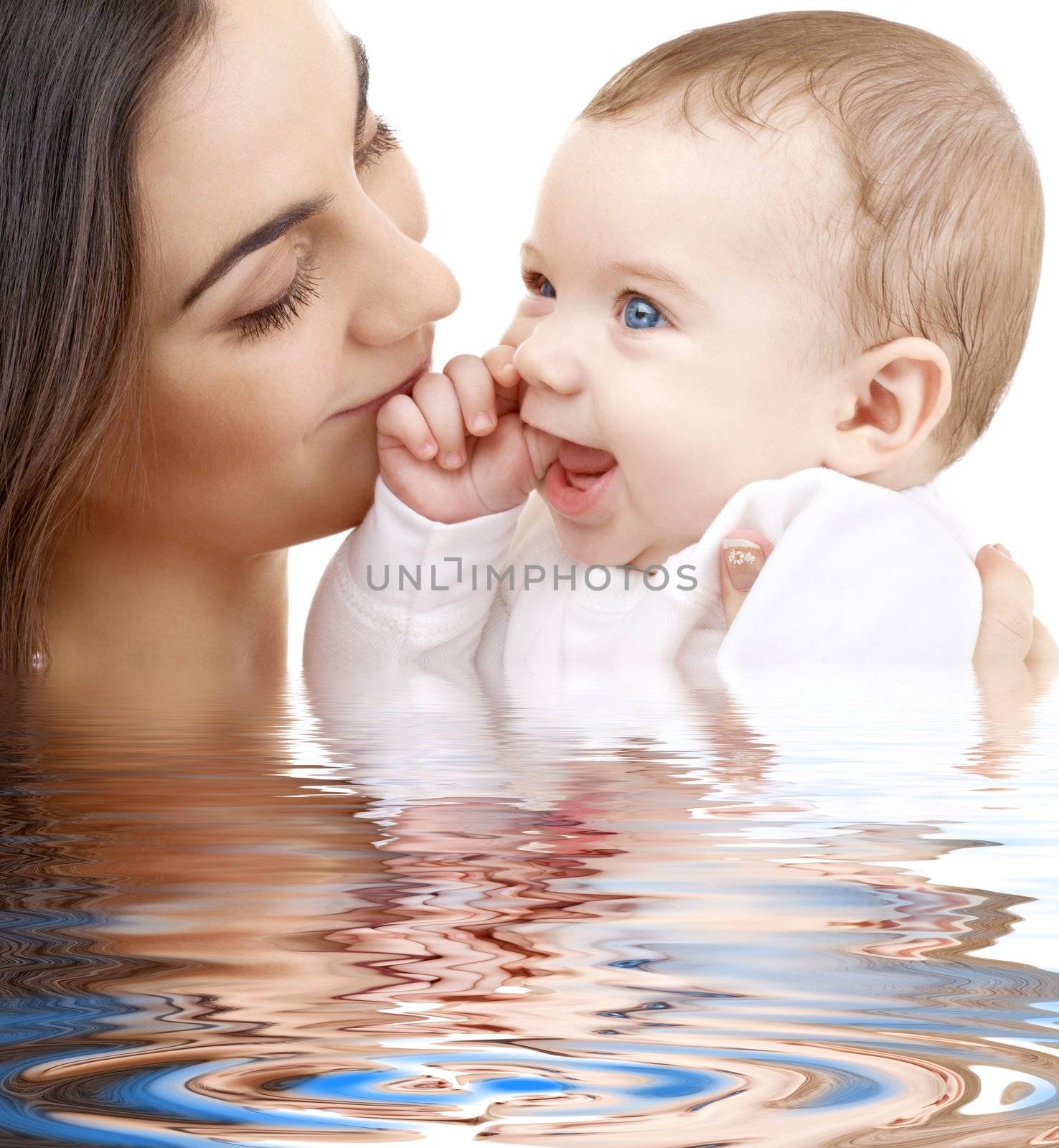 bathing baby in mother hands by dolgachov