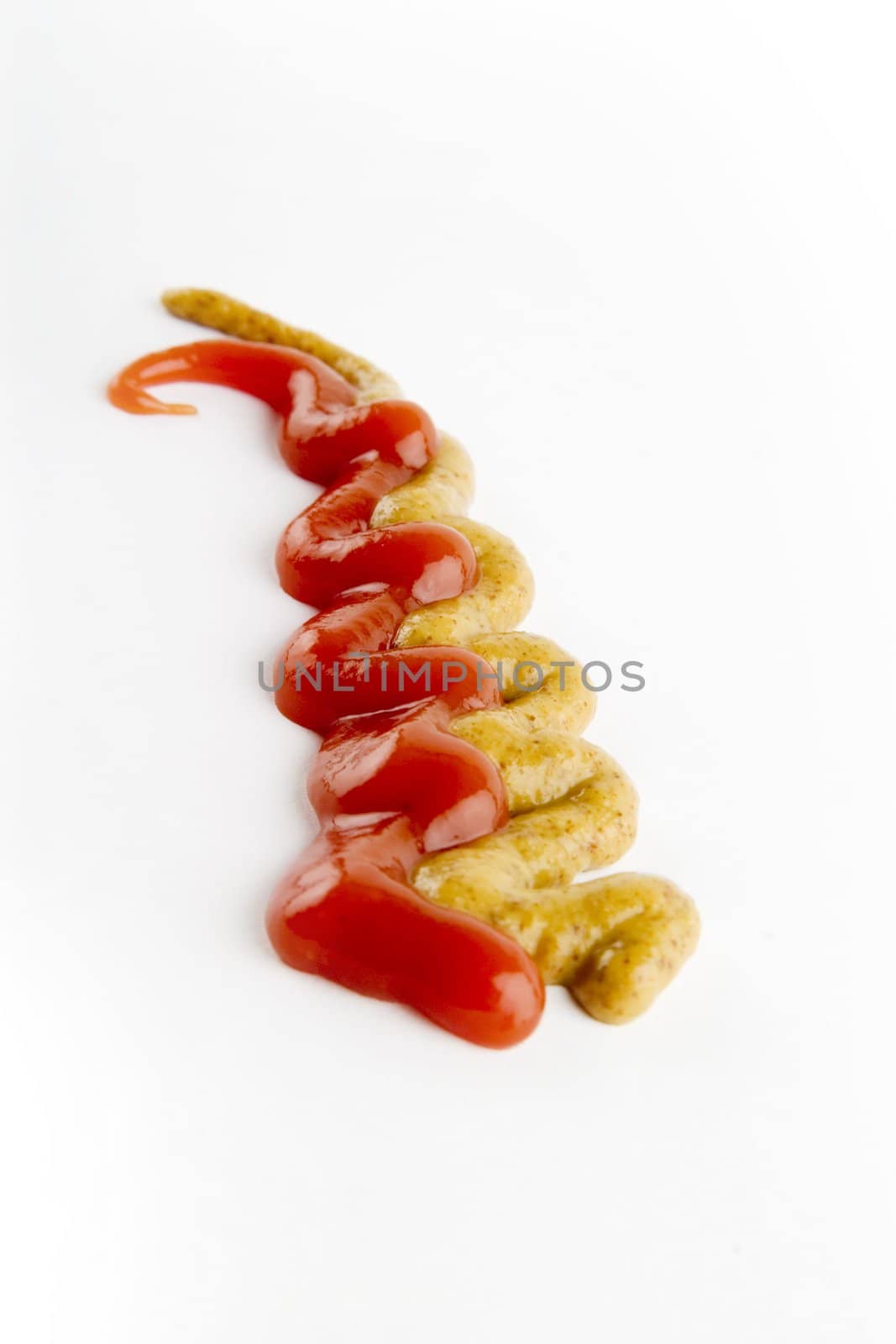 Ketchup and mustard isolated on white.
