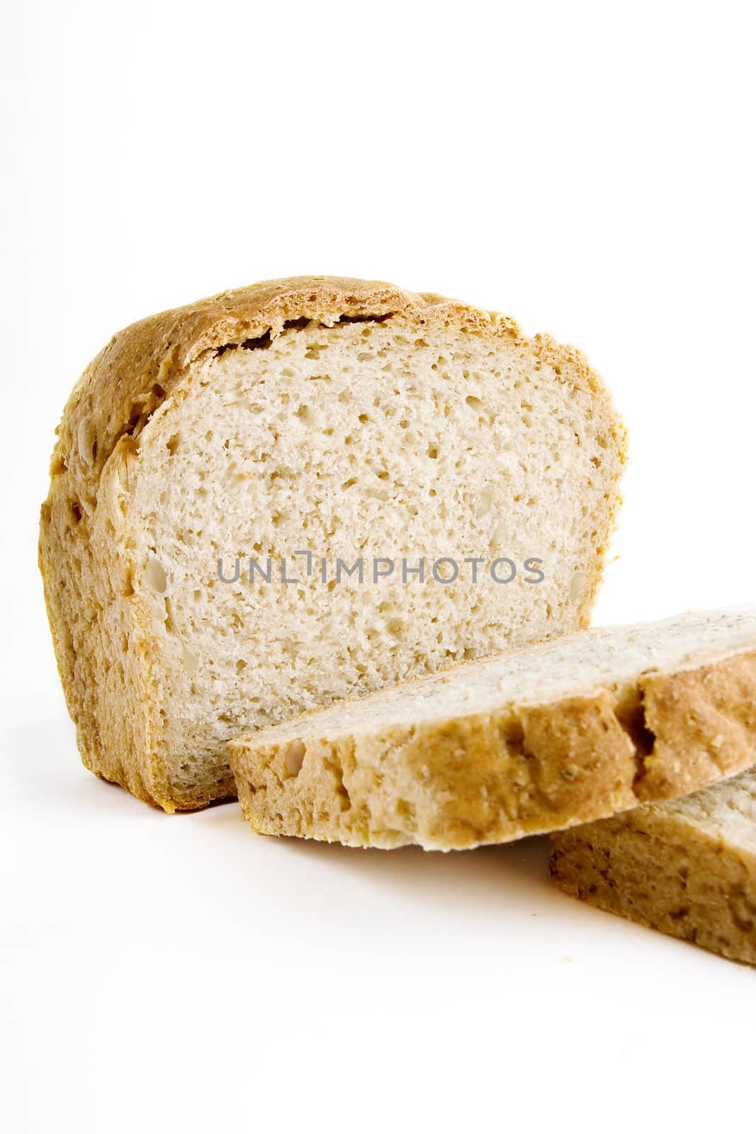 A single slice of homemade bread on a white background.