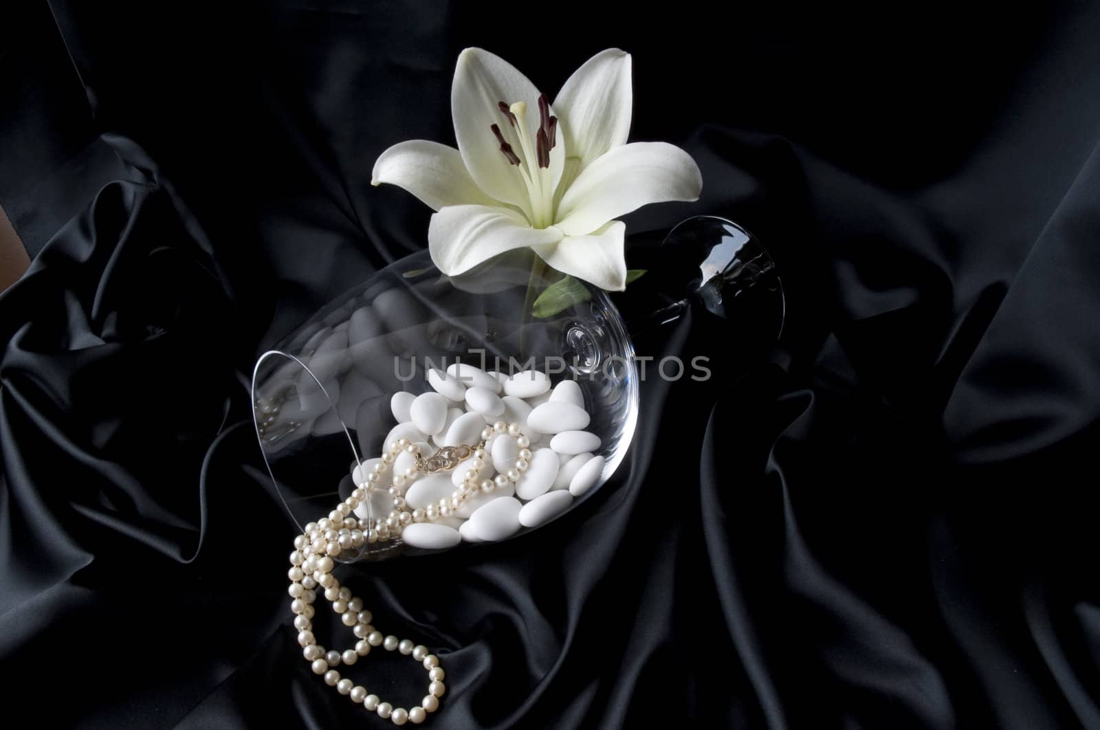 
Jewelry and other precious stones on black background fabric