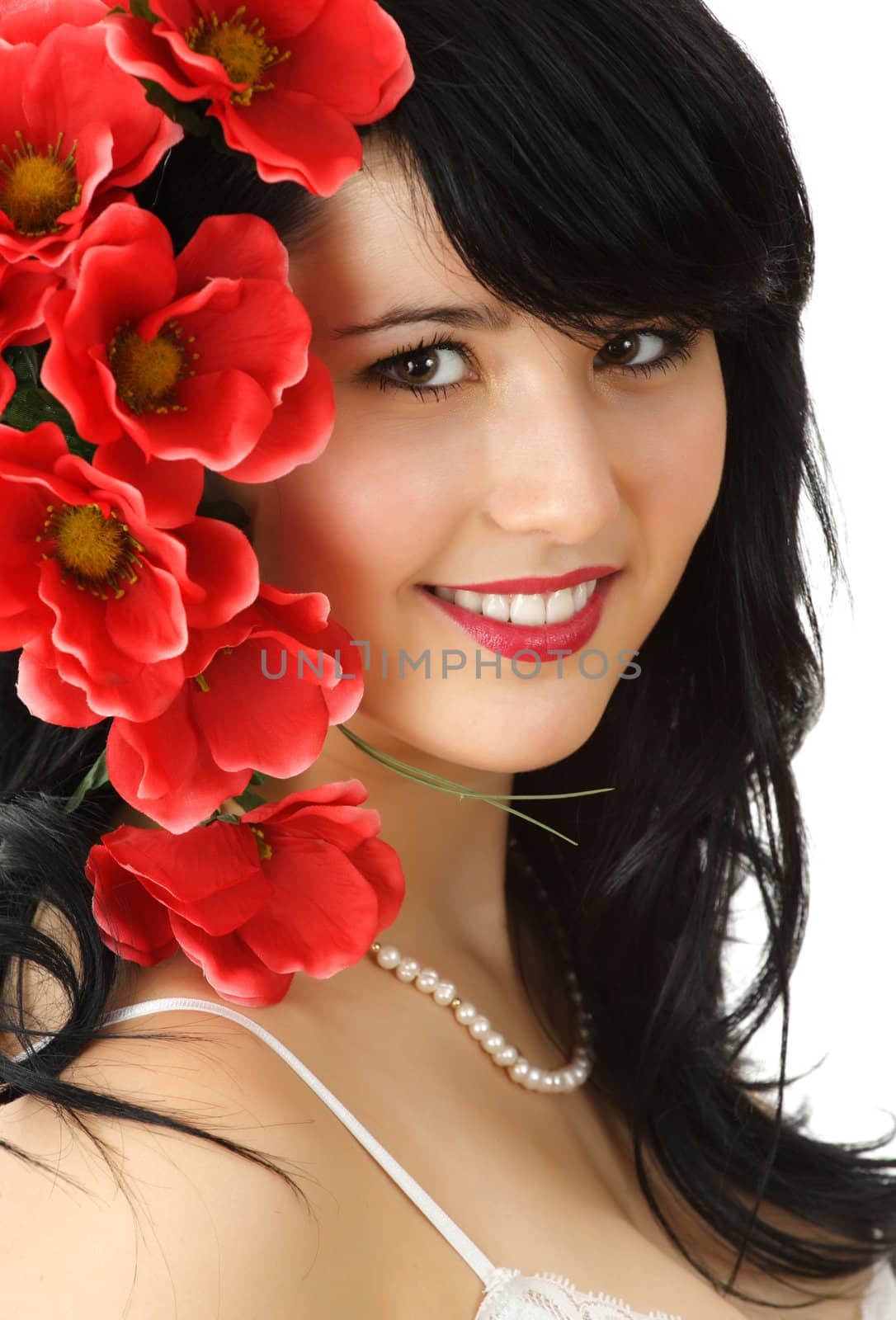 young woman with red fake flowers