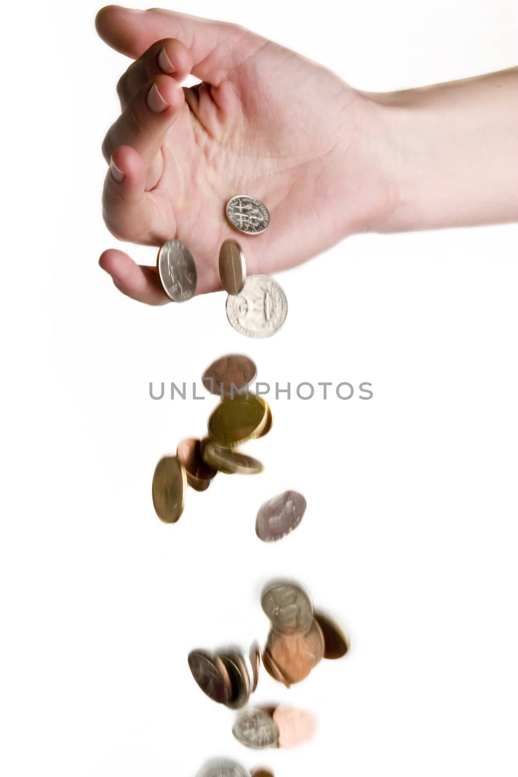 A hand dropping coins