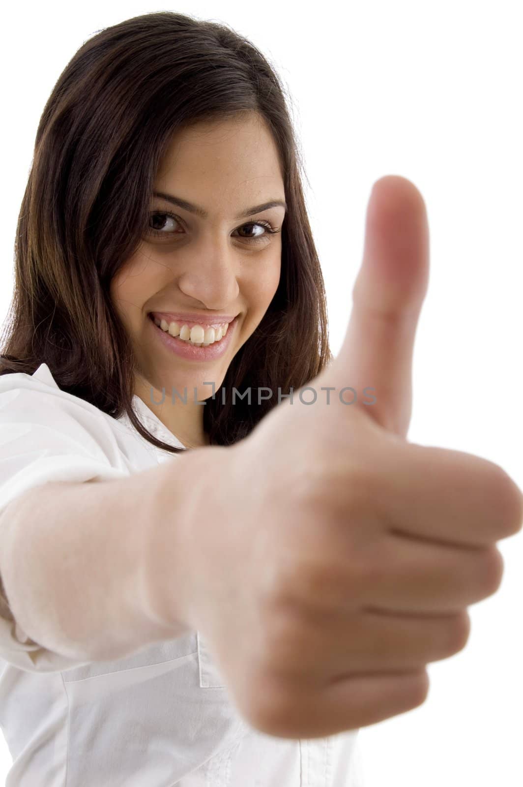 young cute girl showing thumbs up against white background