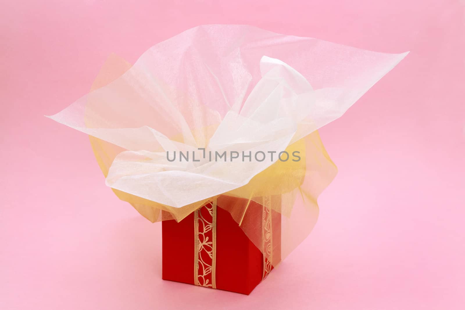 red gift box with pink background