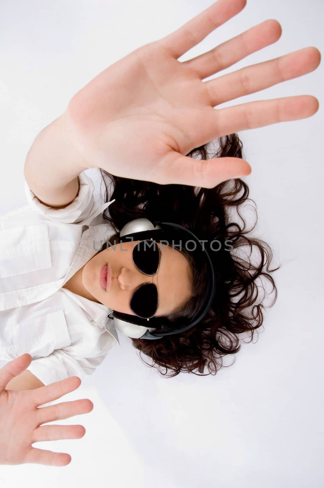 pretty caucasian woman enjoying music with white background