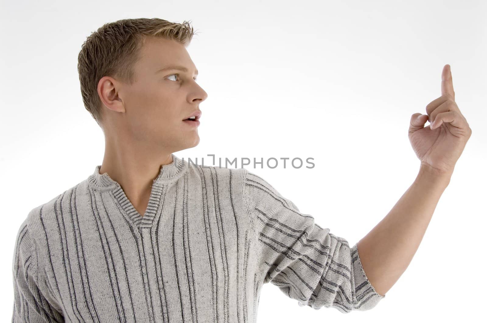 male looking at his index finger on an isolated background