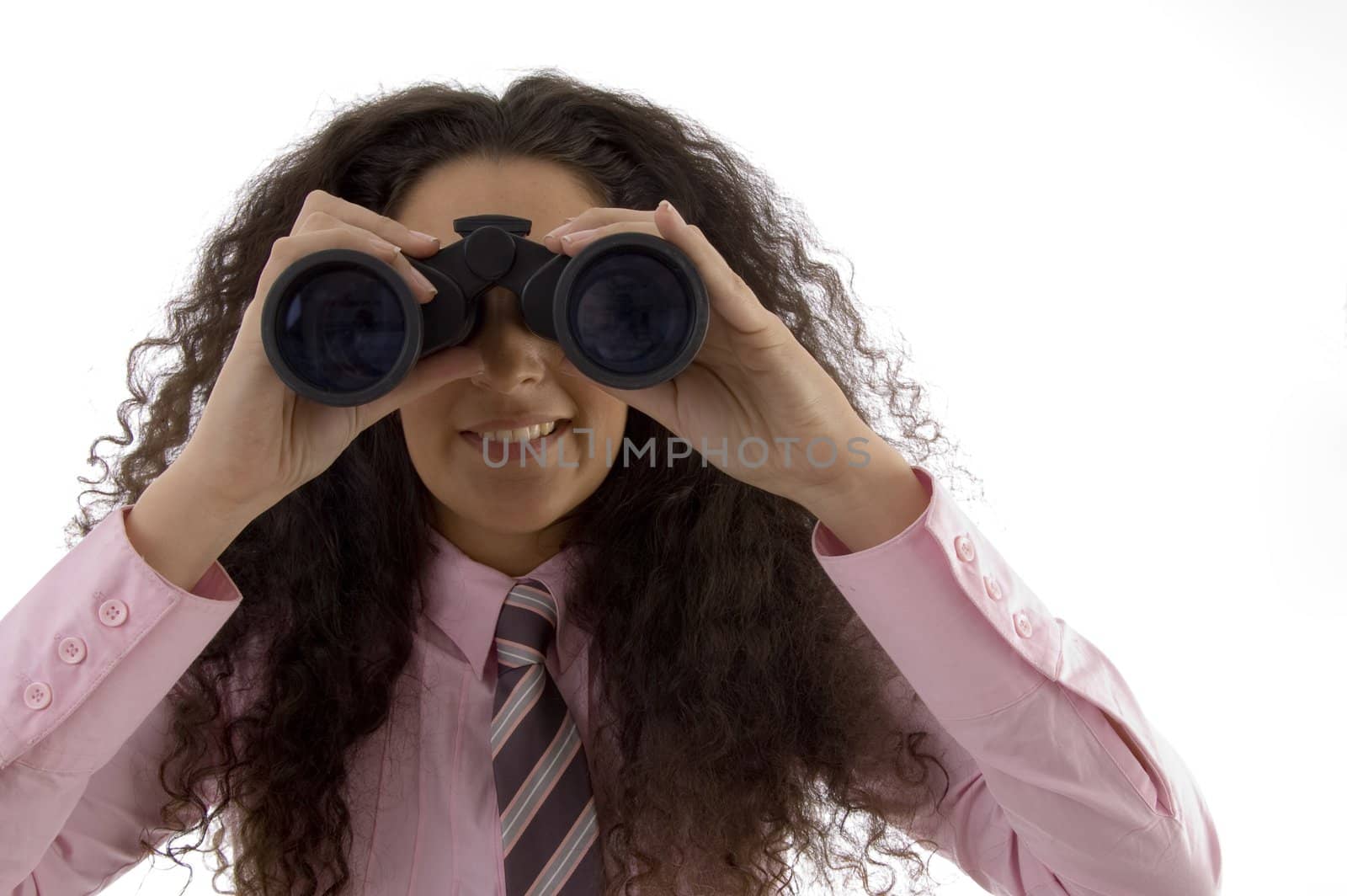 young corporate woman viewing through binoculars against white background